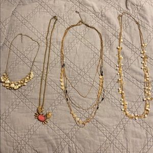 Lot of four gold fashion necklaces